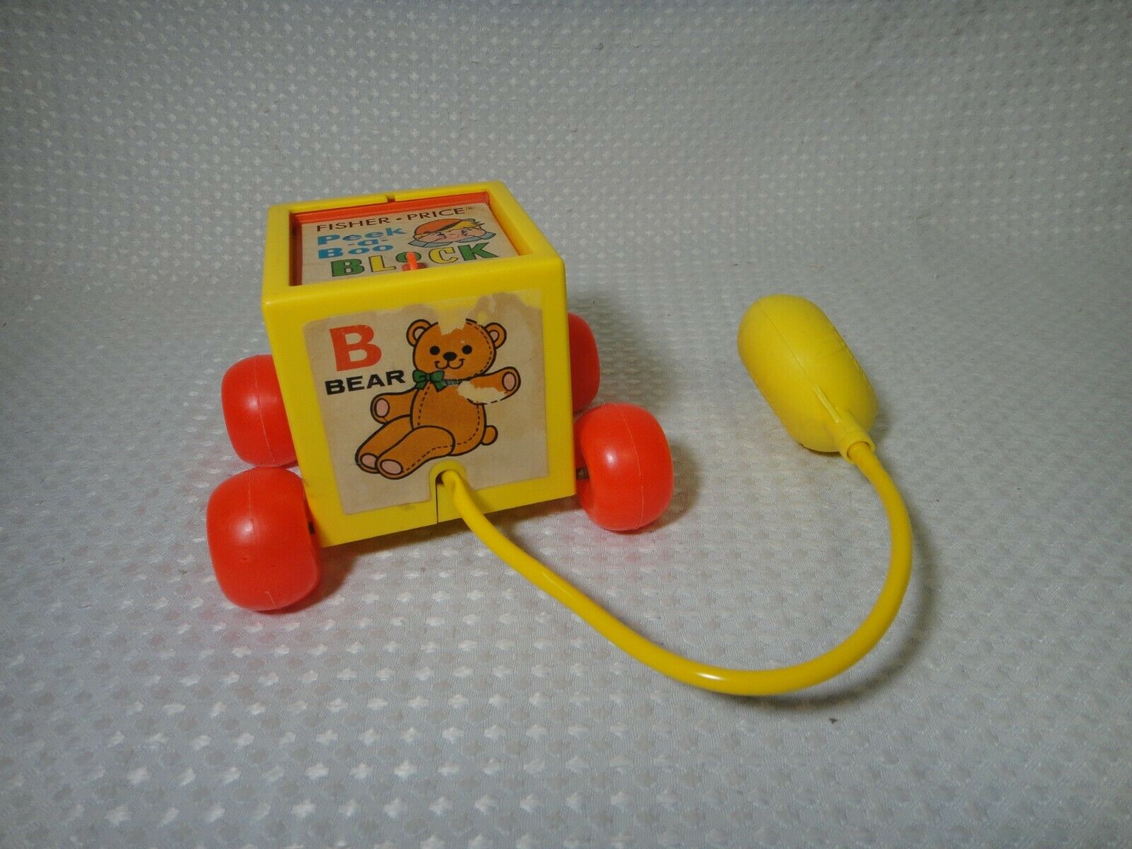 Vintage 1970 Fisher Price Peek A Boo Block Squeeze Bulb Toy # 760